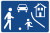 Verkehrszeichen 325.1 Symbol: Menschen mit Ball auf einer Straße vor Häusern